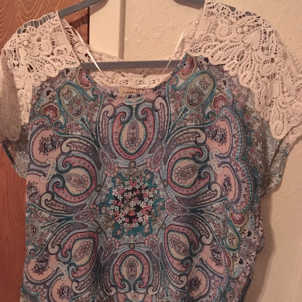 Woman’s sheer multi color medium blouse
